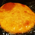 Deep Frying Poori in Hot Oil