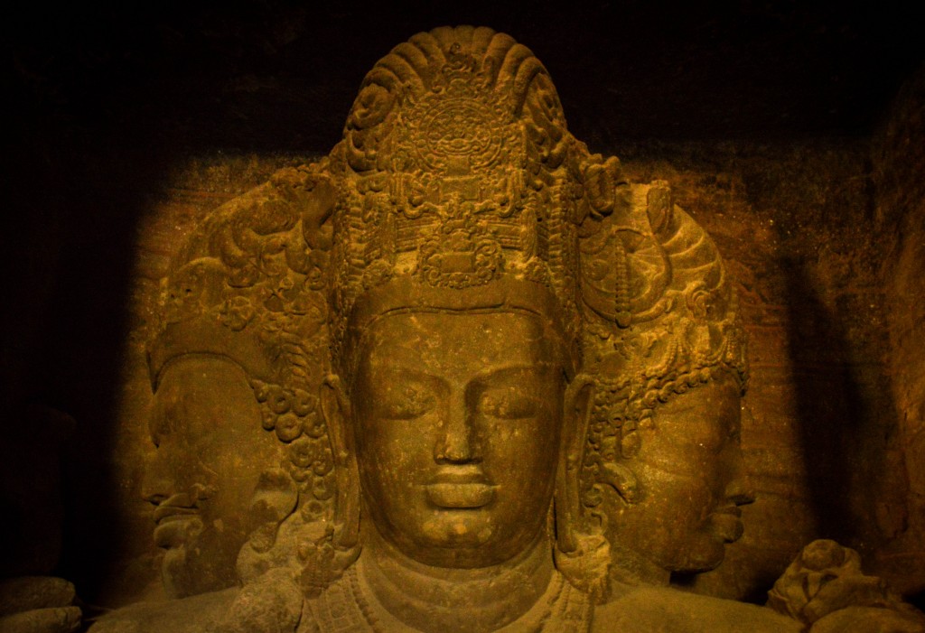 Rock salt carvings based on hindu and buddhist mythology in elephanta caves