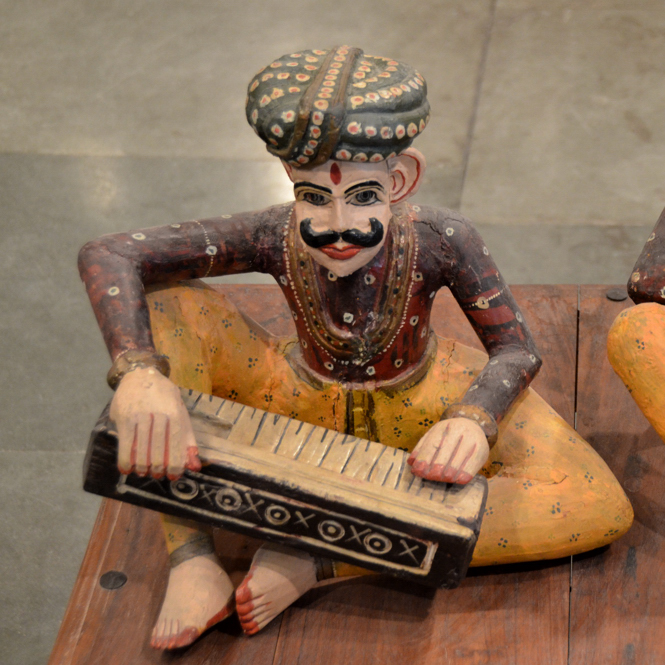 Harmonium player idol at Alankar Museum