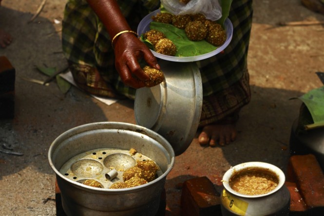 Making ladoos from Pongala