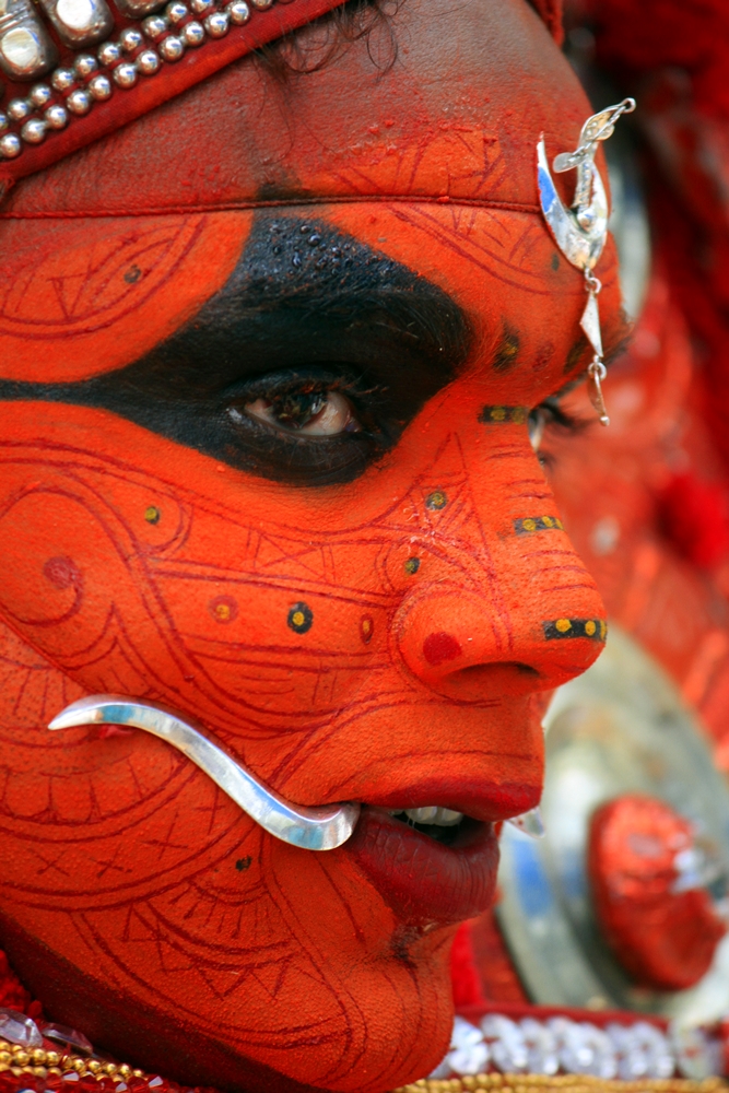 Facial make up of Gulikan Theyyam