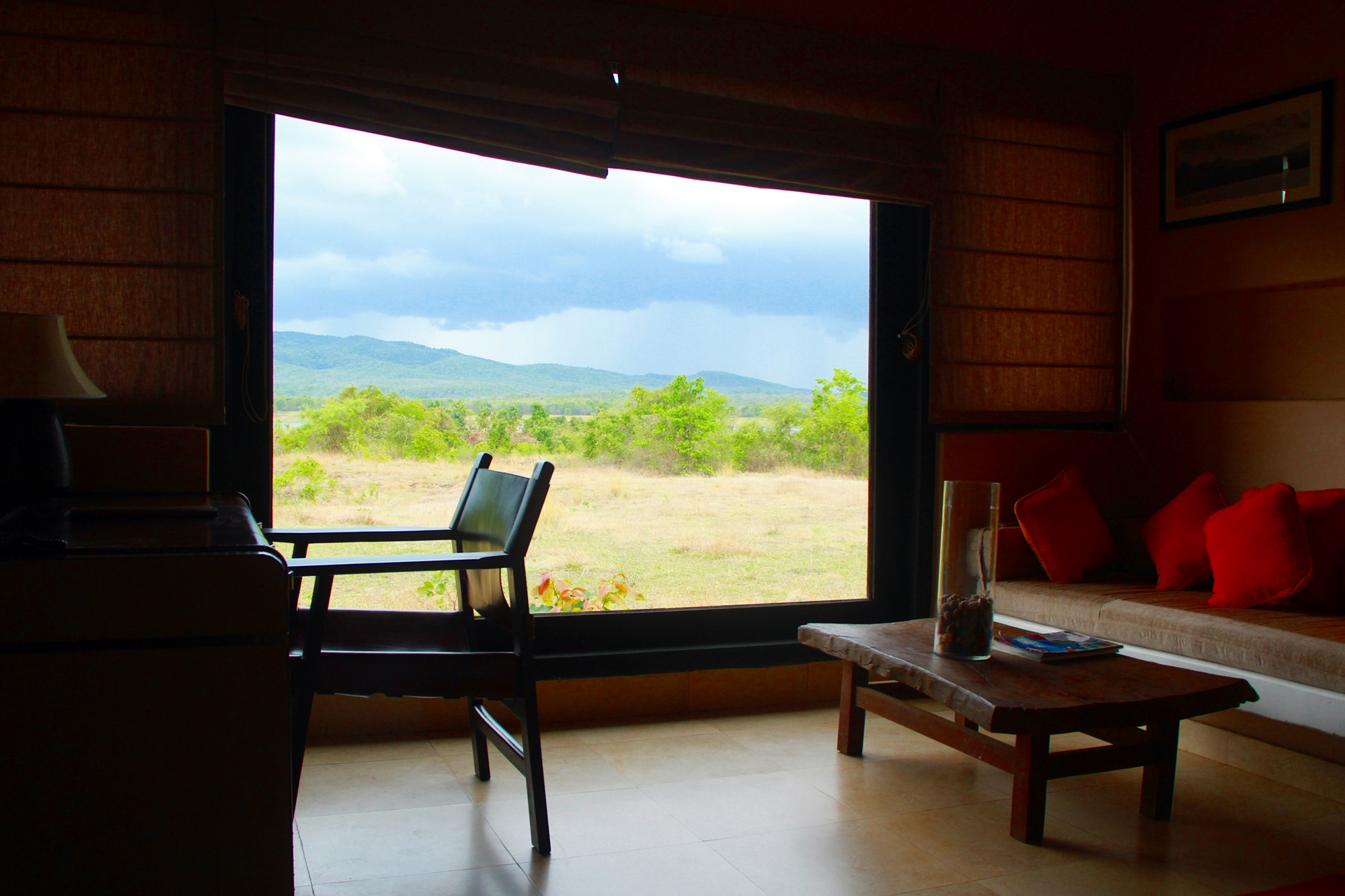 Gigantic french window in the room to enjoy the never ending grasslands/