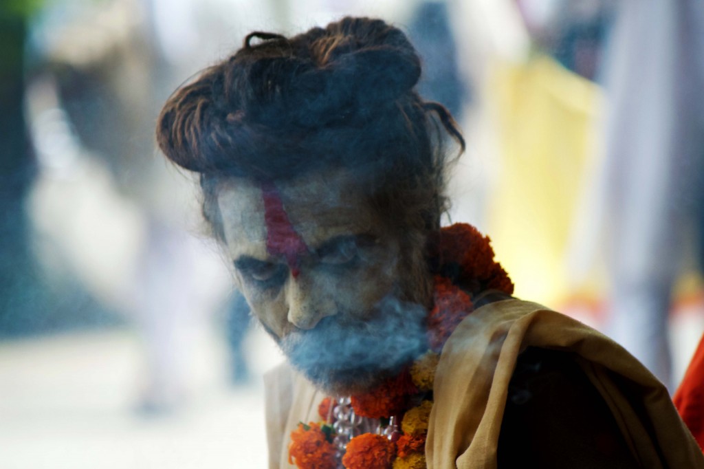 At Ramkund, these sadhu surrounded a tree and made food for himself in small fire. 