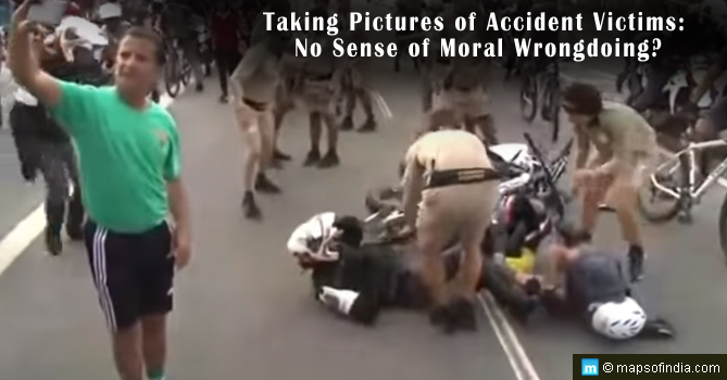 பார்வையாளர் விளைவு  Taking-pictures-of-accident-victims