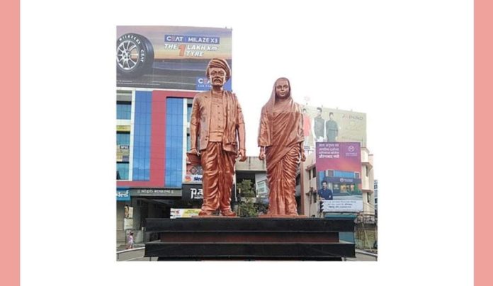 This statue shows the famous couple Savitribai and Jyotirao Phule who famously opened a girl's school in which city in 1848?