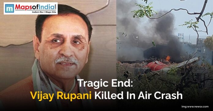 Wreckage of the crashed aircraft that killed former Gujarat CM Vijay Rupani, surrounded by rescue personnel in a remote hilly area.