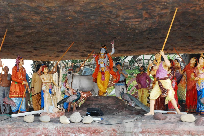 Krishna Lifting Govardhan Mountain